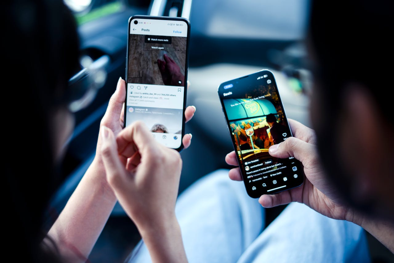 The Art of Drawing Readers In: Your attractive post title goes here A couple engaging with social media on smartphones indoors, illustrating modern digital connectivity.